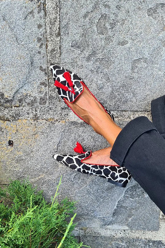 ANIMAL PRINT LOAFERS WITH RED TASSELS